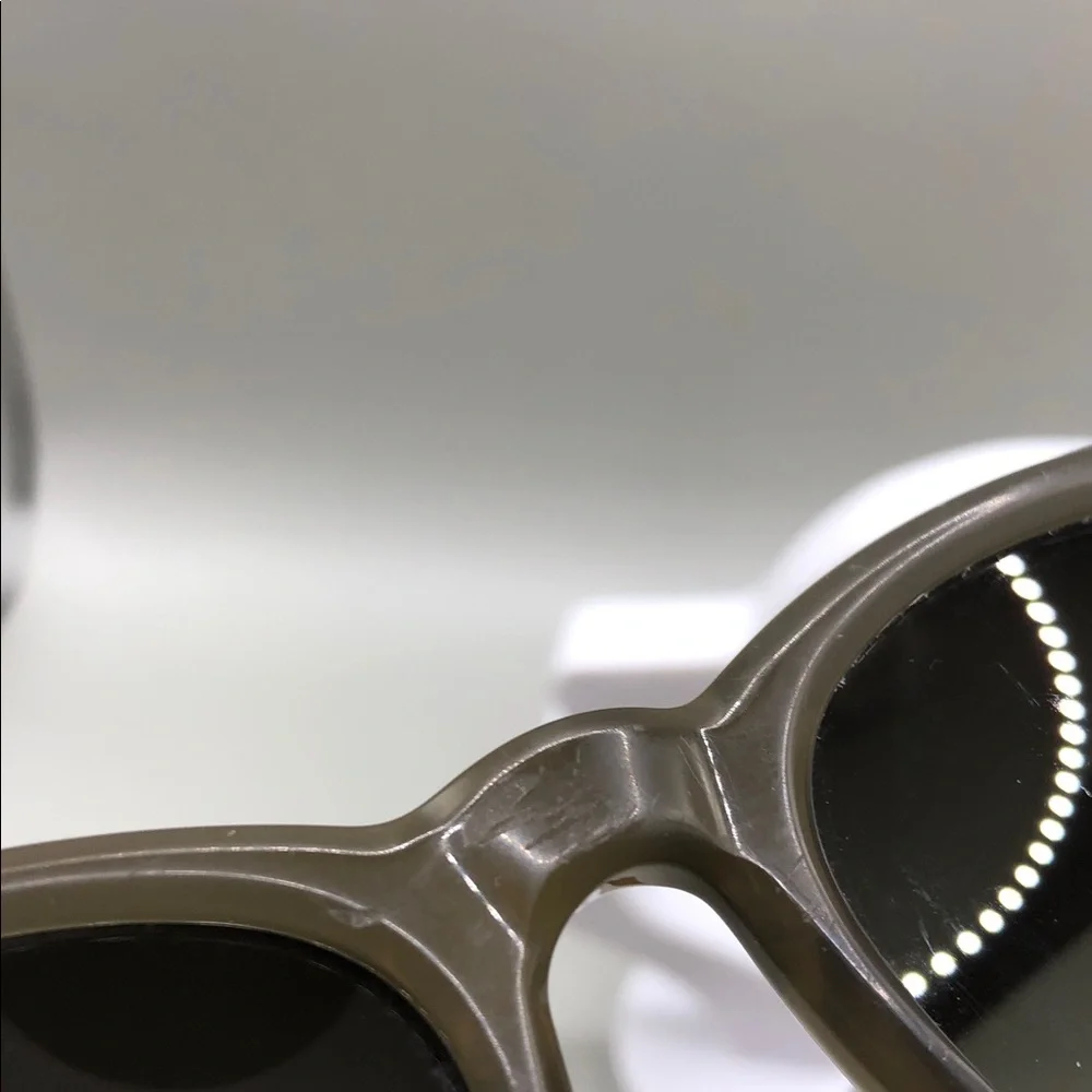 KREWE lens scratches